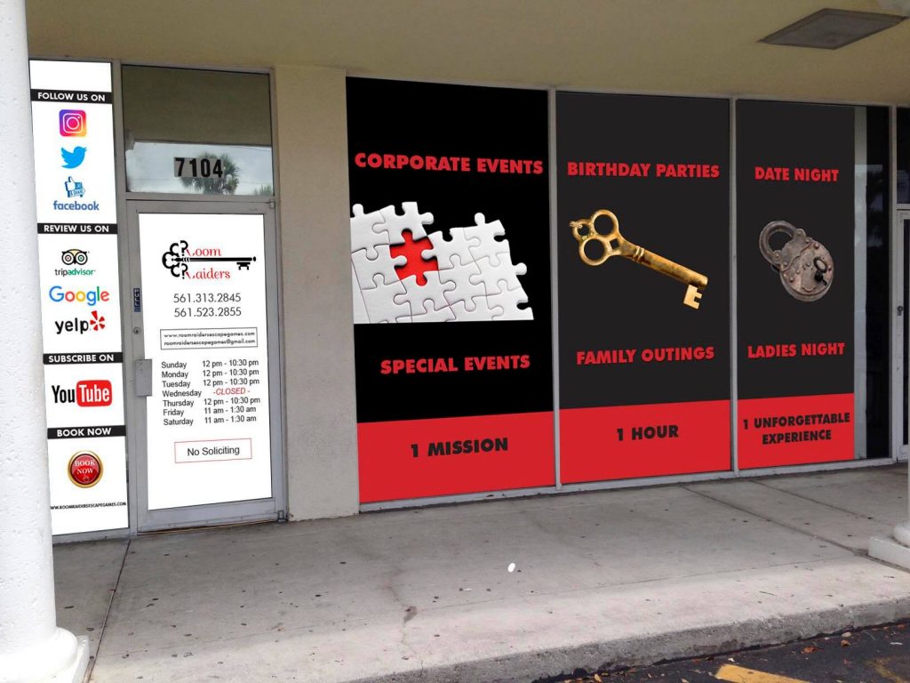 A building with several different types of business signs on the side.