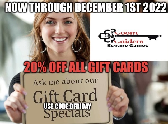 A woman holding up a sign with the words " ask me about our gift card specials ".