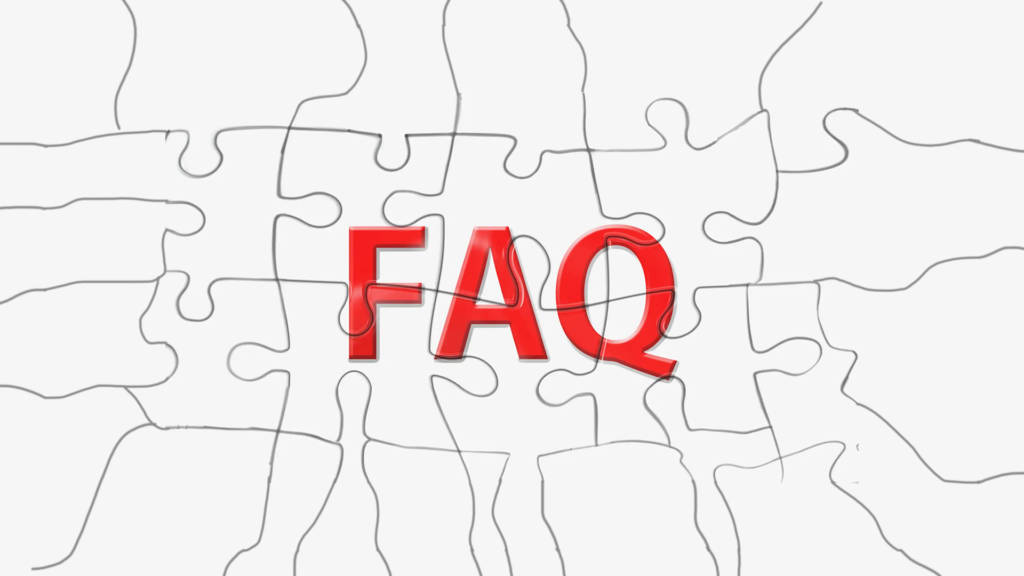 Red FAQ letters on a white jigsaw puzzle background.
